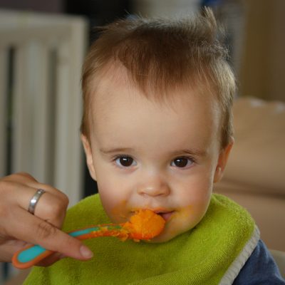 baby eating spoon of food
