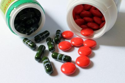 bottle of supplements overturned